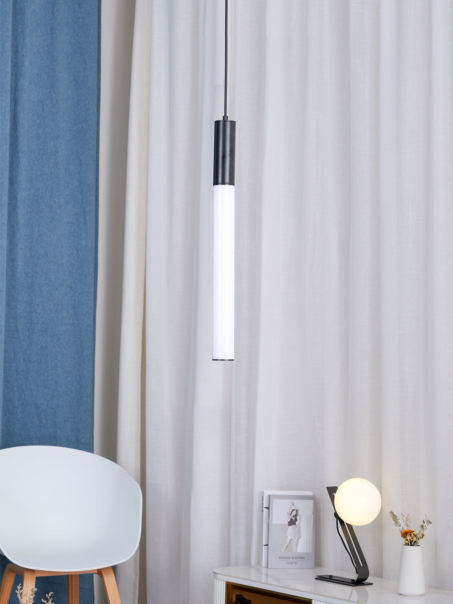 Narrow Black-and-White bar beside room furnishings