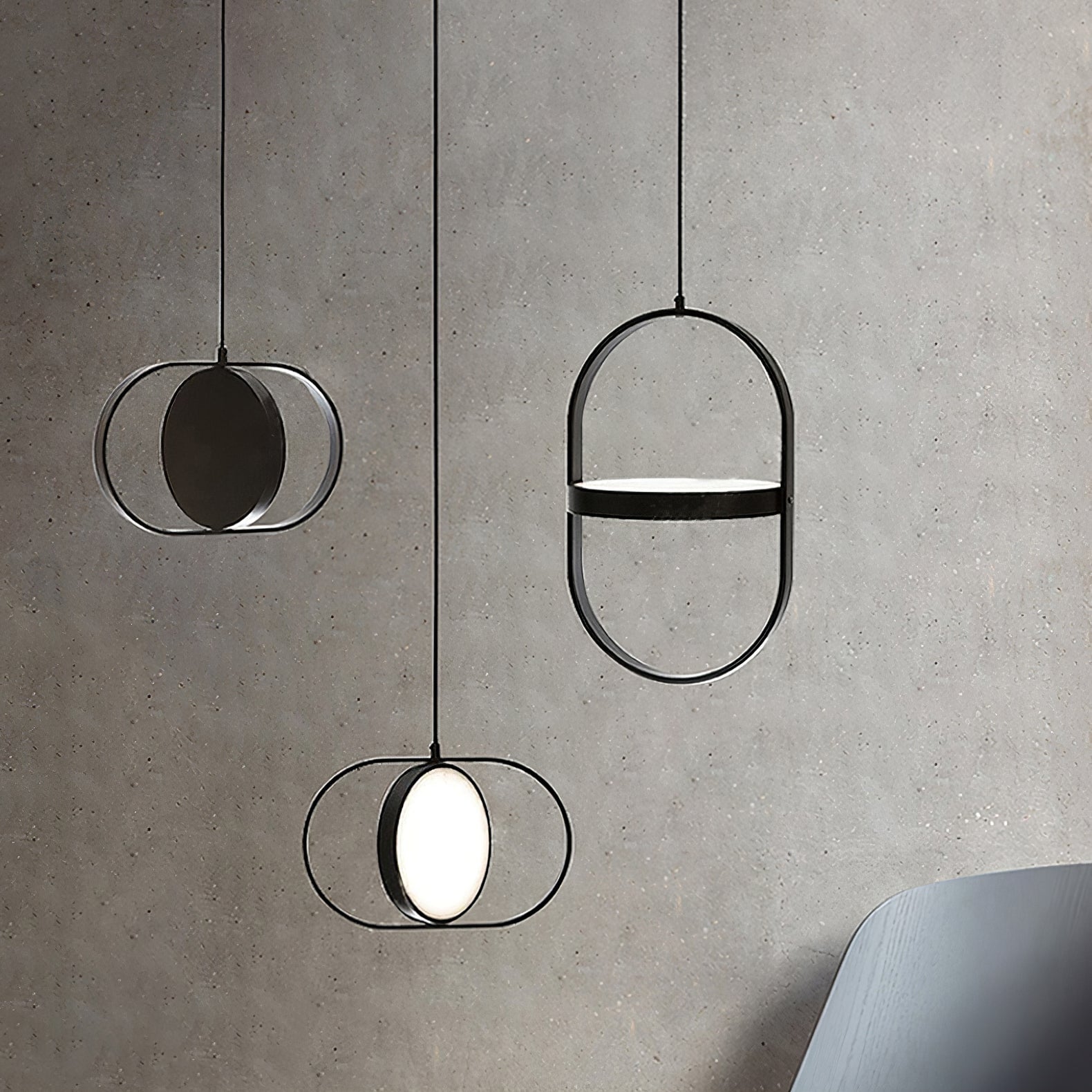 Horizontal and vertical KUU frames against grey plaster