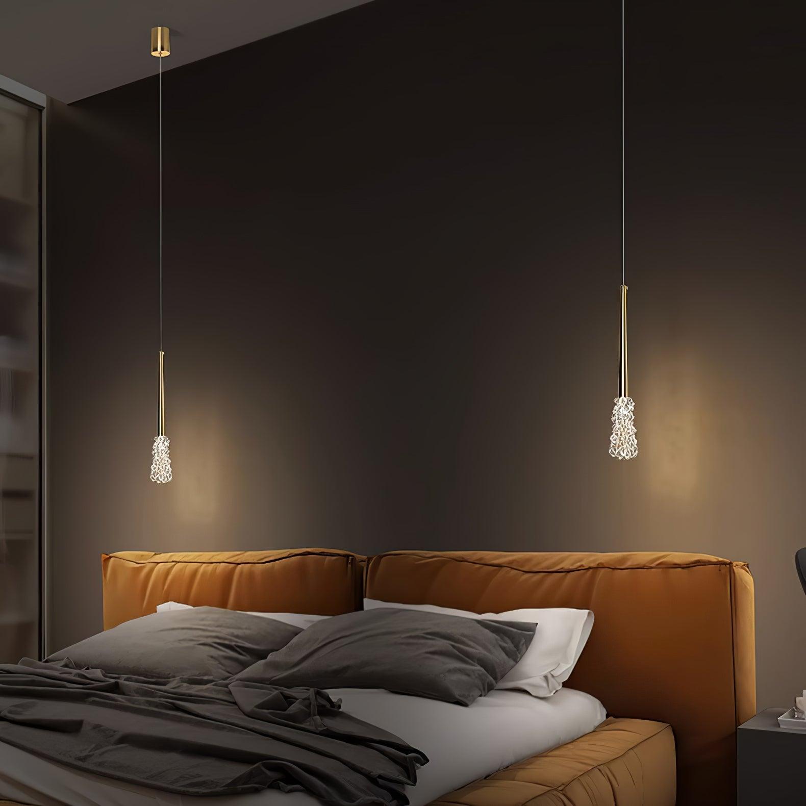 Single Mozzi pendants on either side of a bed