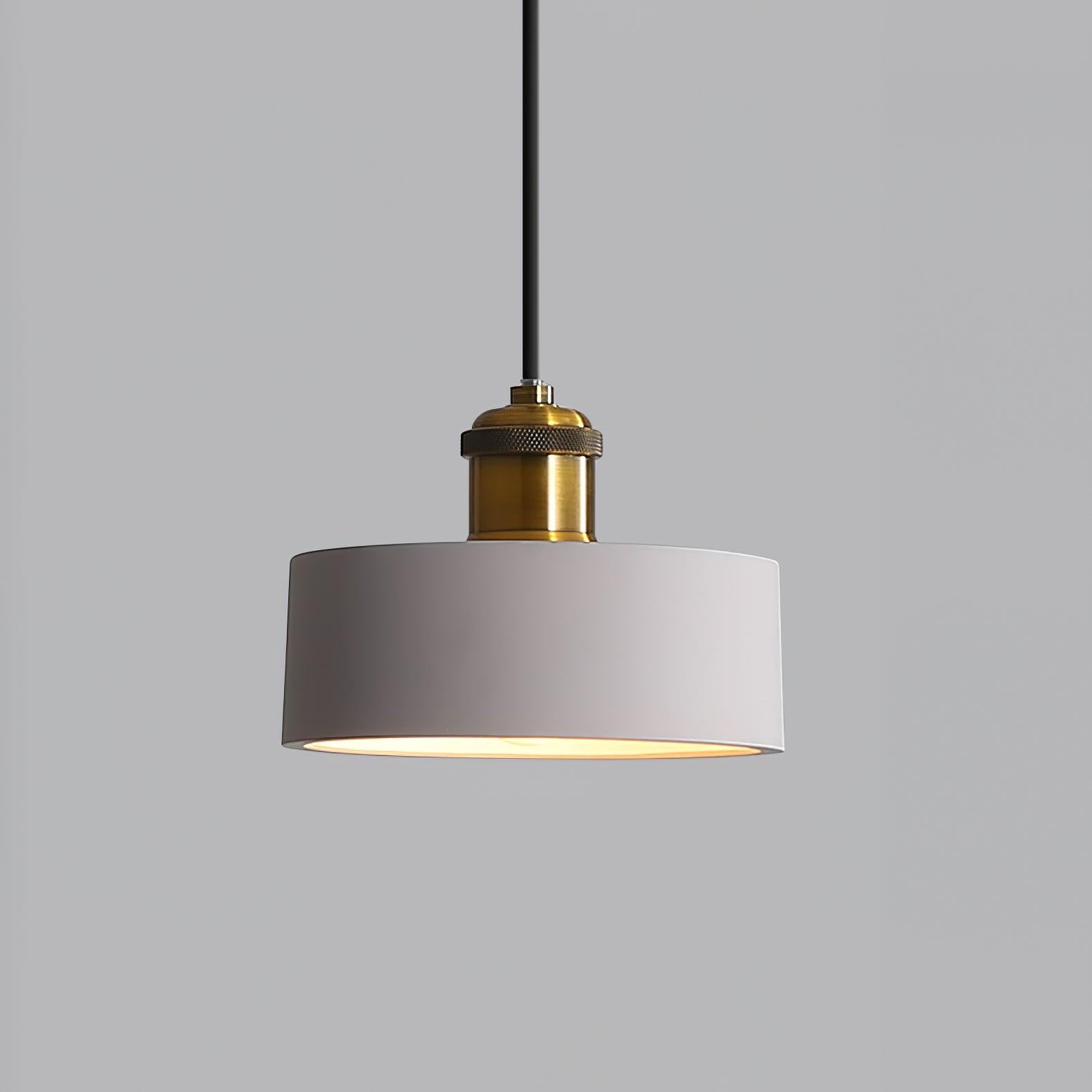 Grey drum shade with a gold-coloured upper fitting