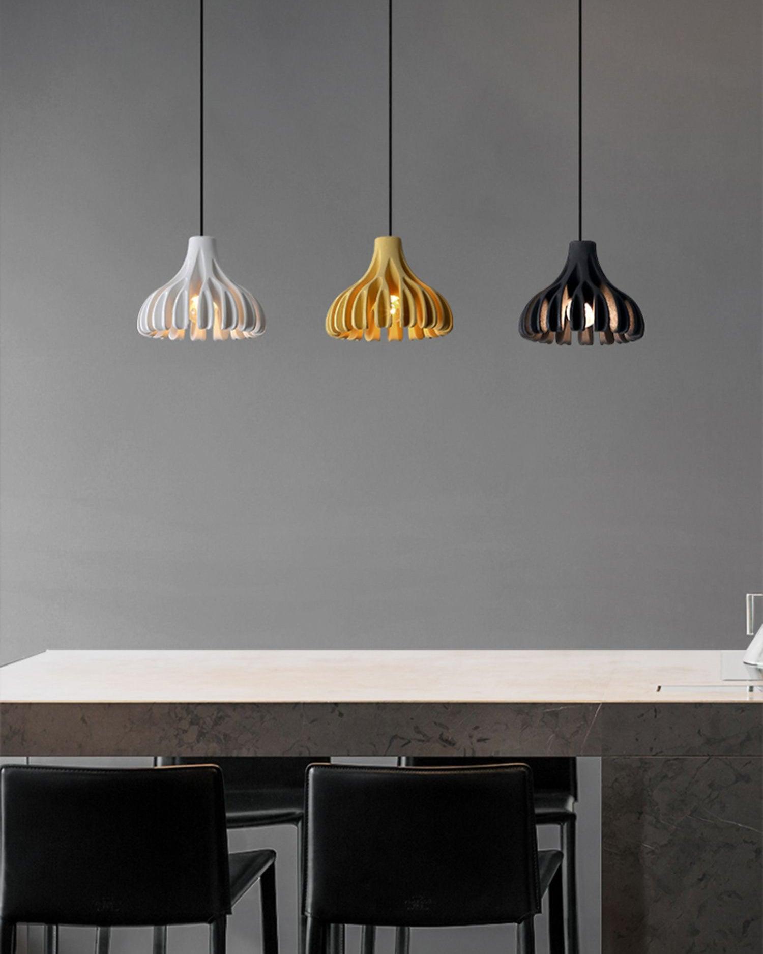 Three resin pendants above a counter