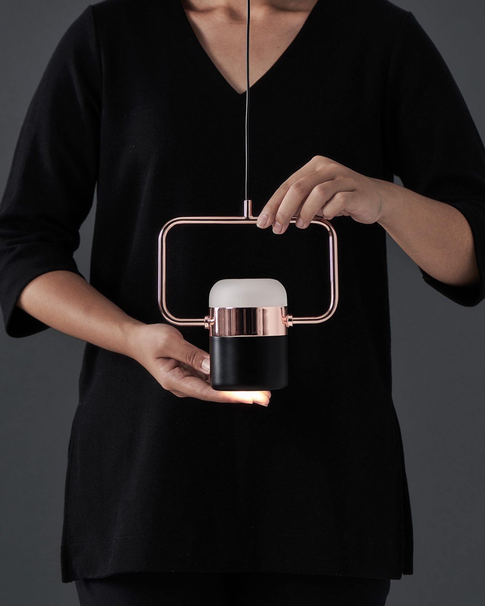 Geometric LED pendant light with adjustable cylindrical heads
