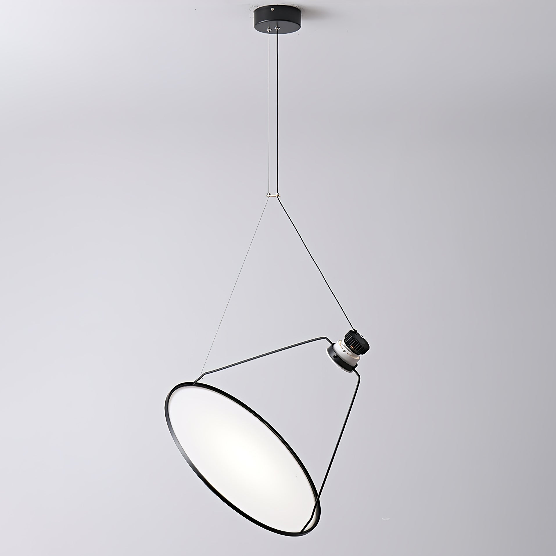 Dark-edged luminous disc on thin suspension