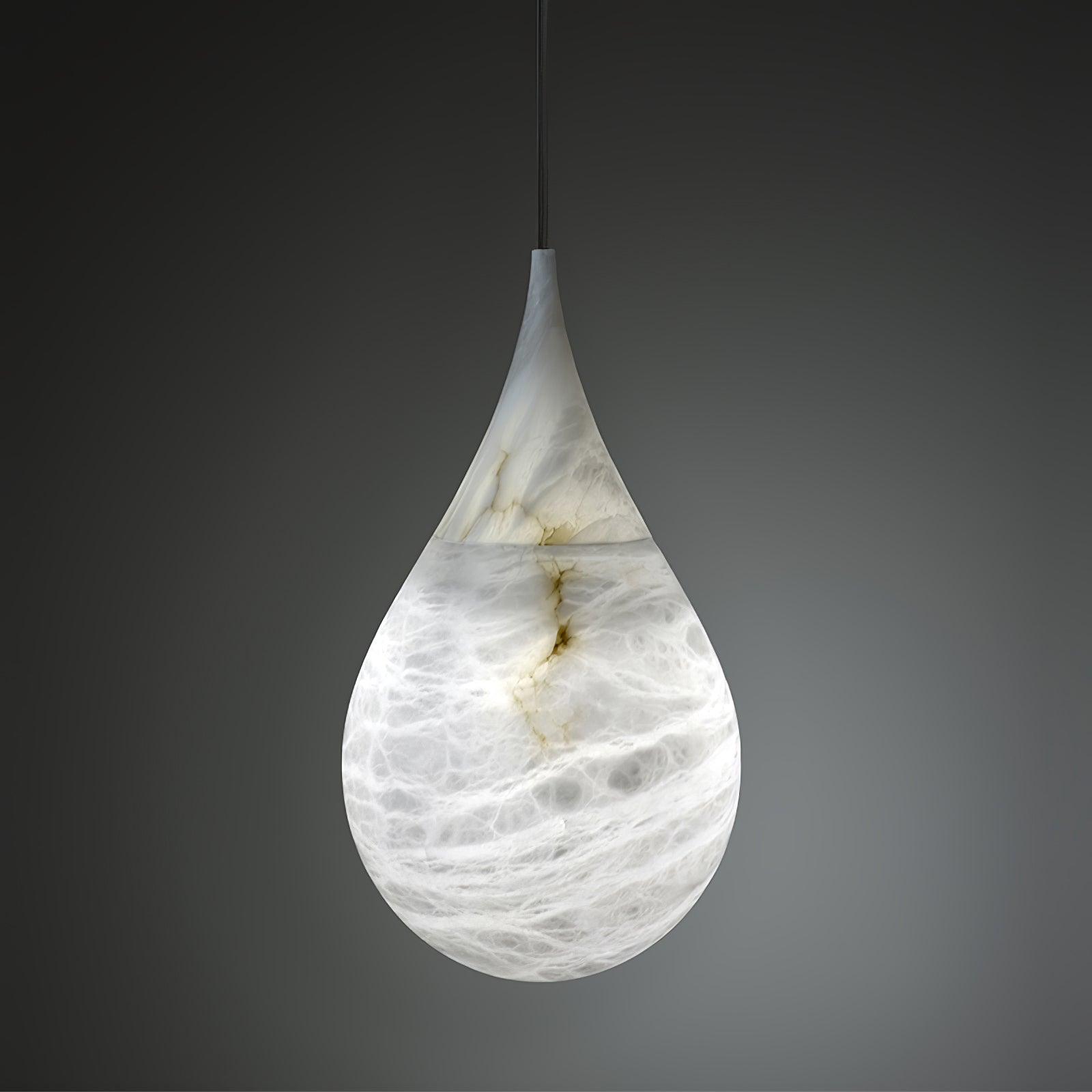 Illuminated White marble teardrop on a dark background