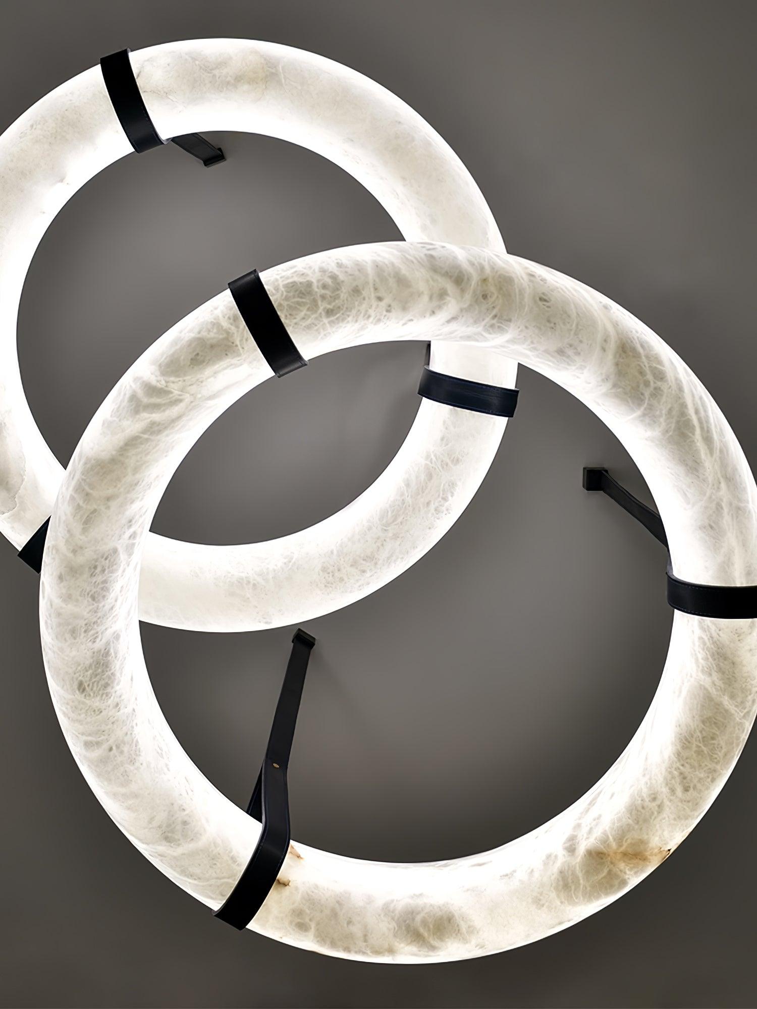 Two overlapping illuminated alabaster rings