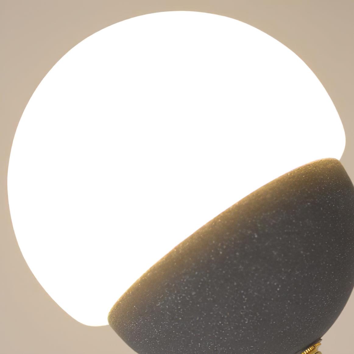 Close view of textured cap and smooth White globe