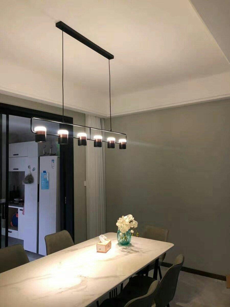 Geometric LED pendant light with adjustable cylindrical heads