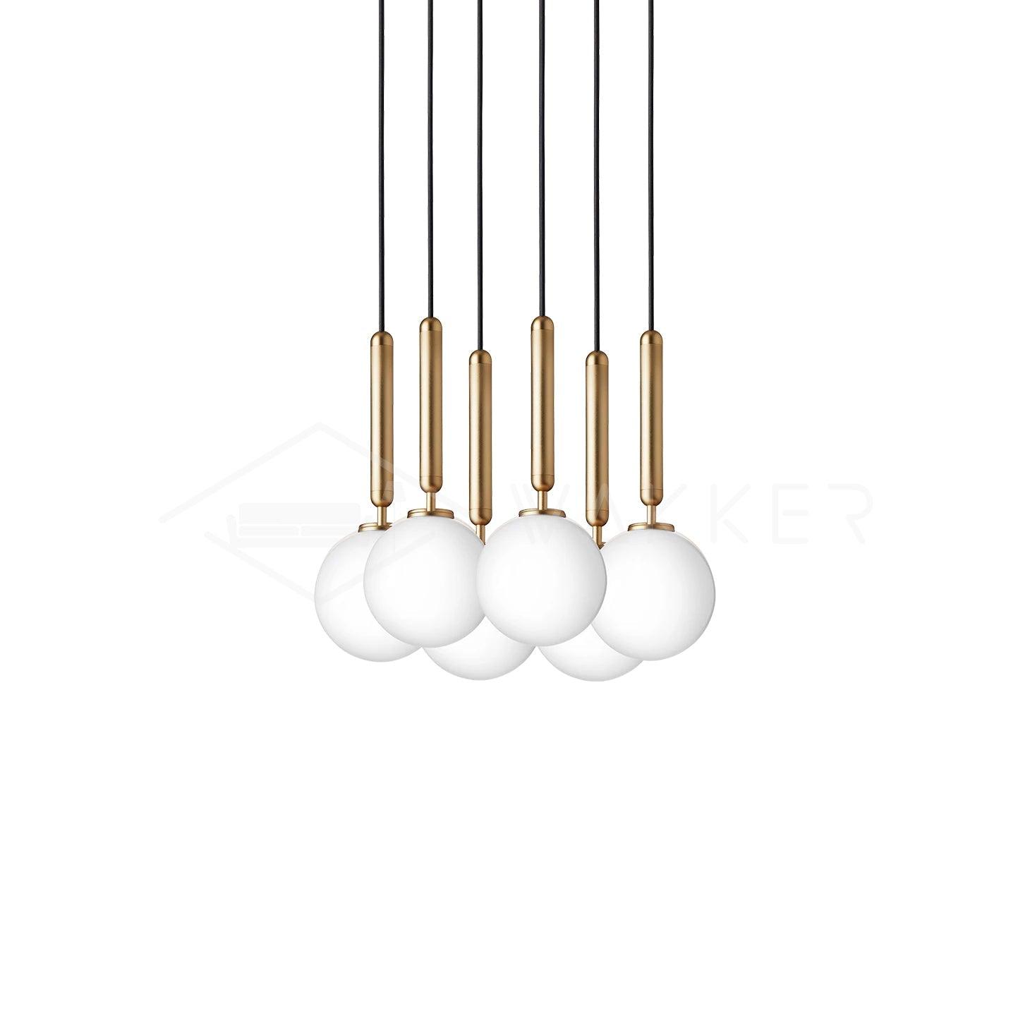 Closely grouped white globes with brass stems
