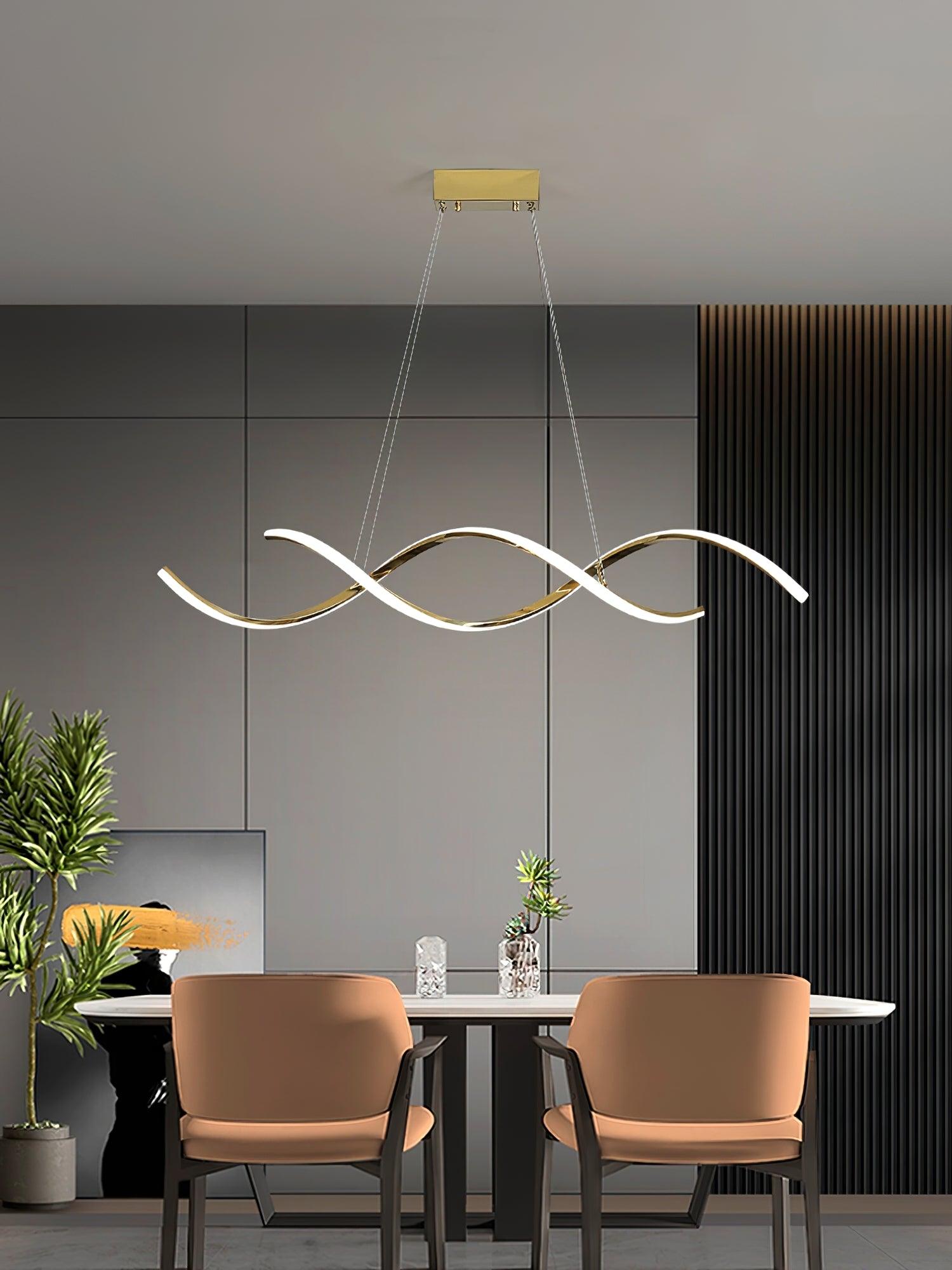Front view of glowing gold wave ribbons above a dining table with orange chairs
