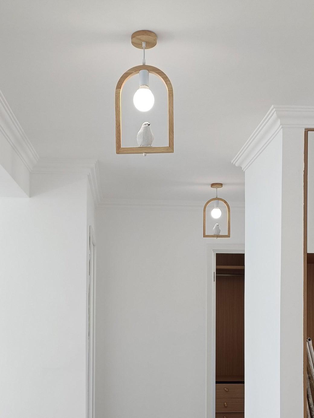 Bird pendants arranged along an interior