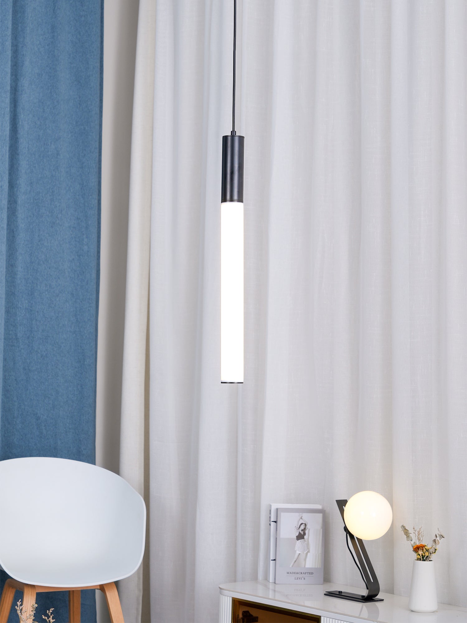 Single Black Signal pendant in an interior