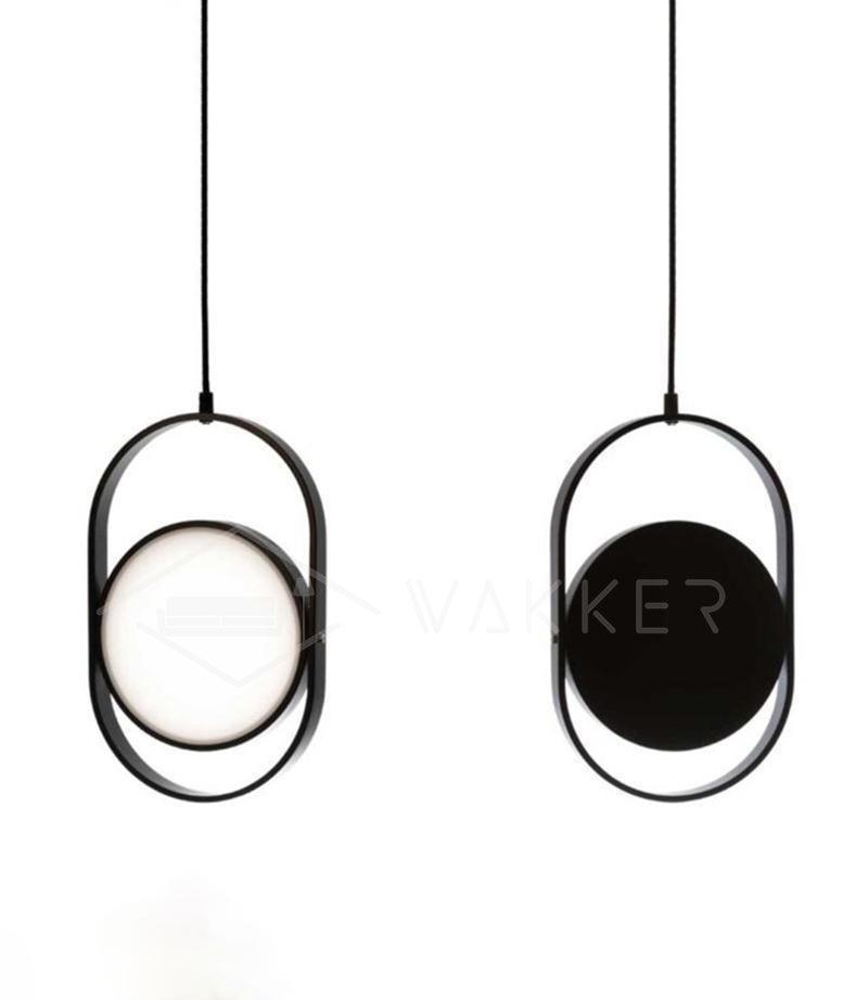 Two vertical Black KUU frames showing light and dark disc faces