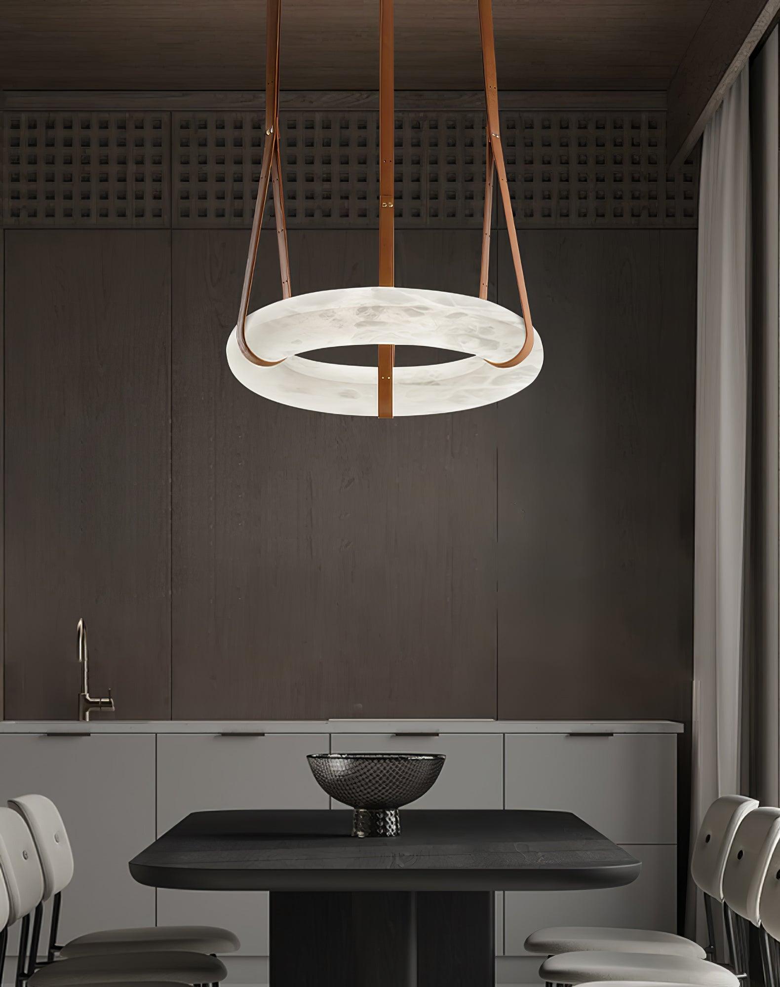 Ring pendant above a dining table and bowl