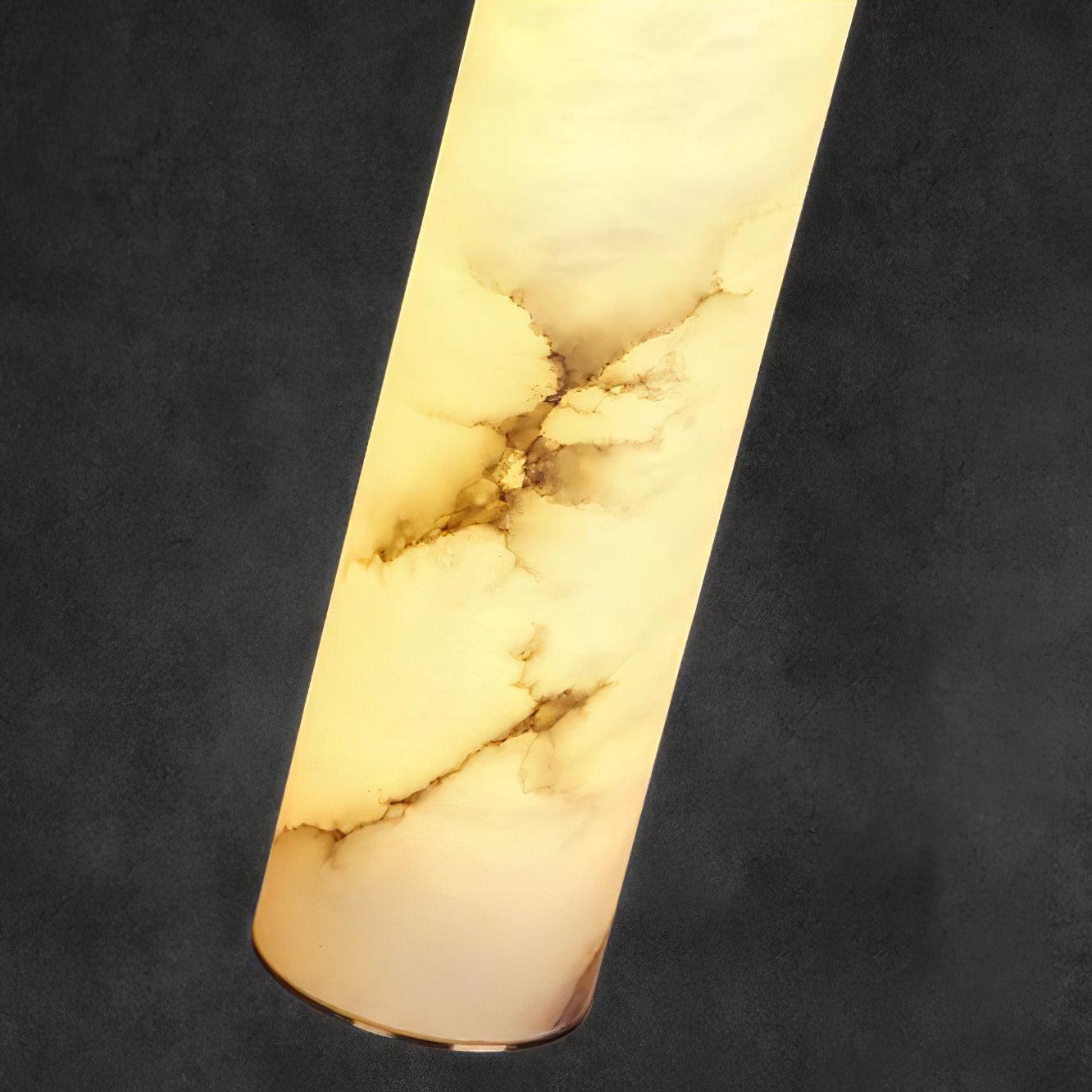 Close-up of irregular dark veining in a lit alabaster tube