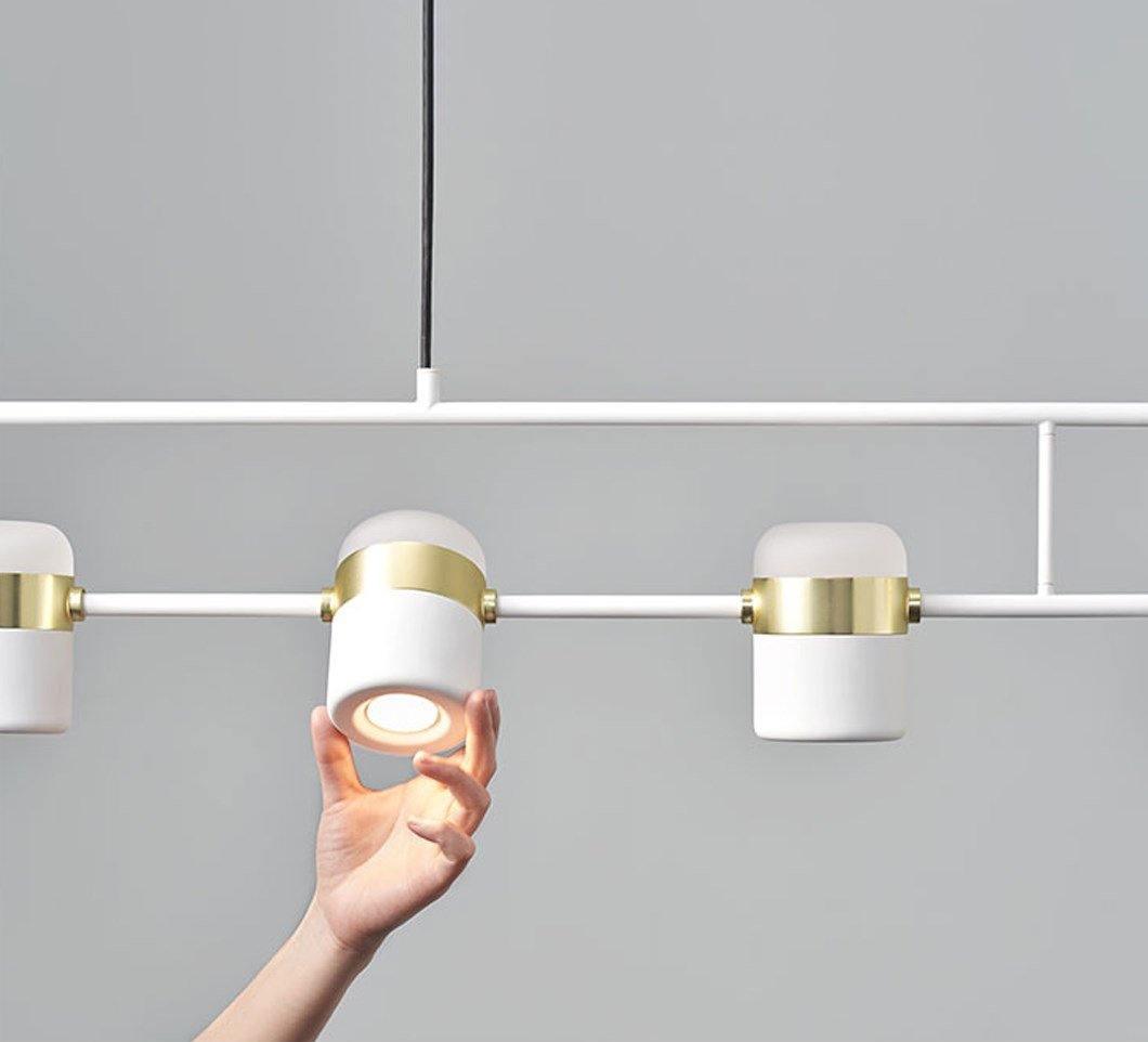 Geometric LED pendant light with adjustable cylindrical heads