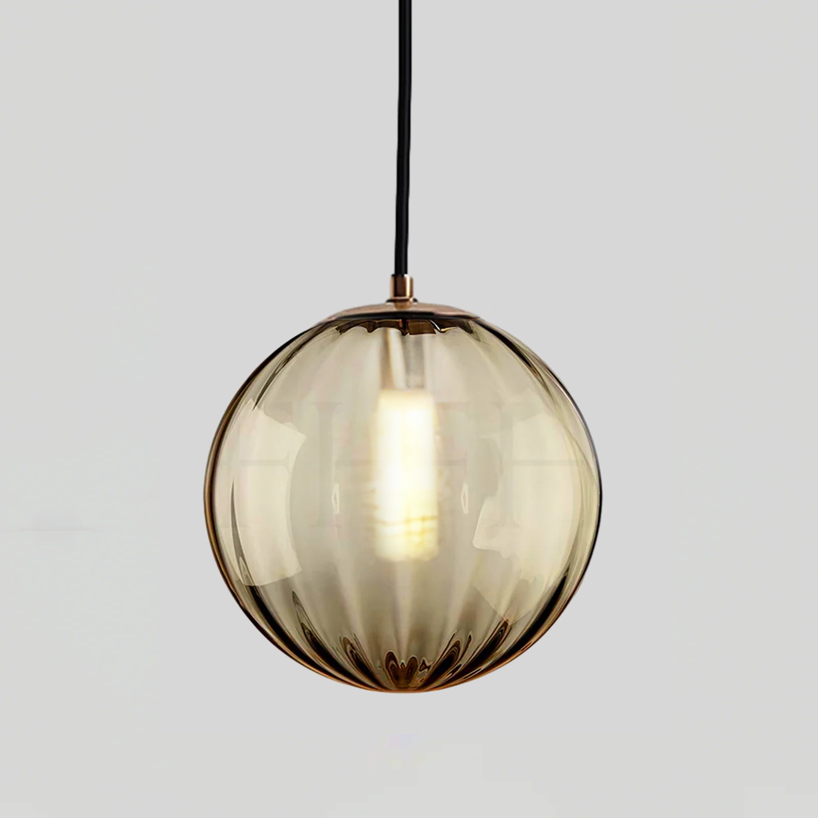 Paola pendant light with a coloured glass globe and small metal cap