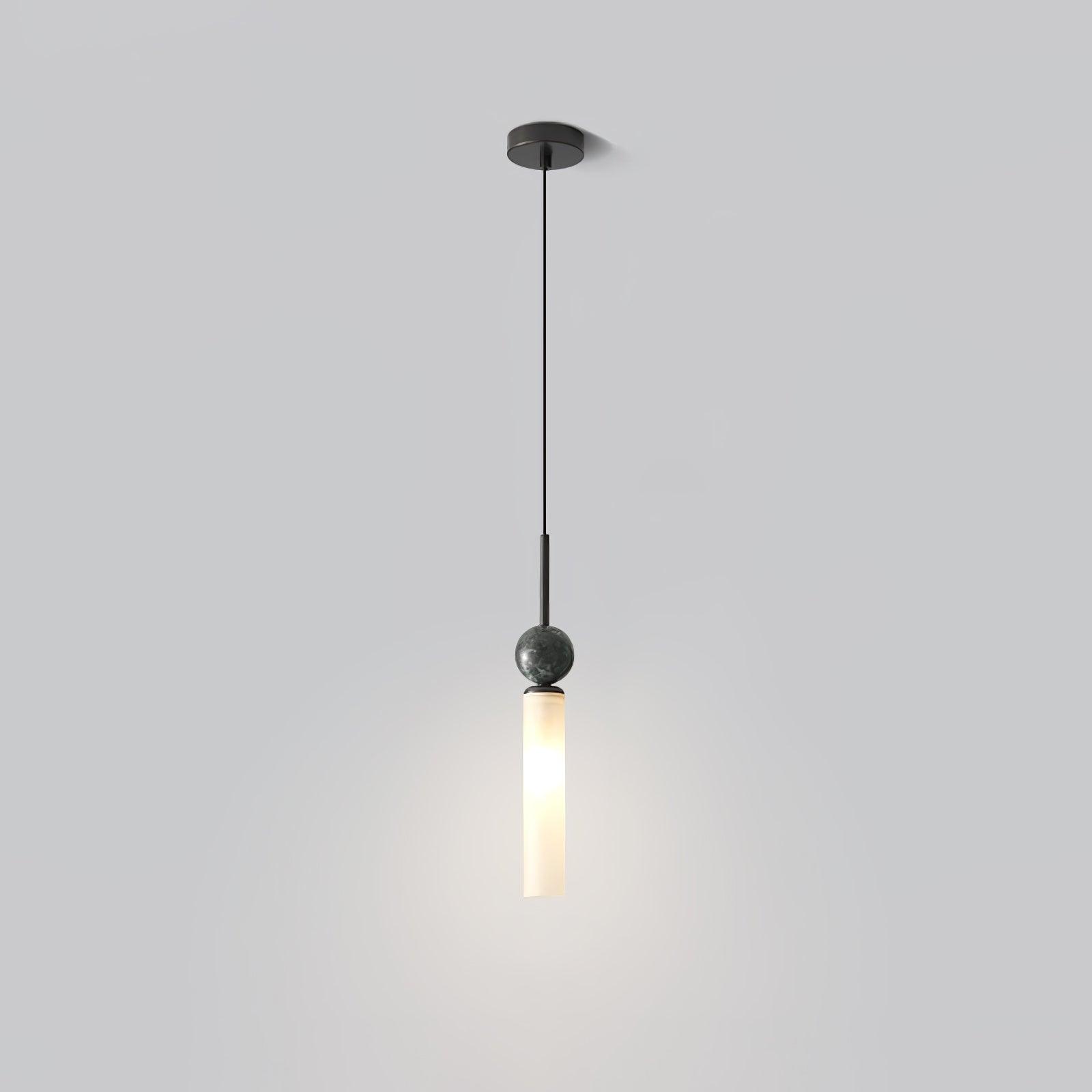 Isolated black single pendant with small canopy, veined dark sphere and long white diffuser on pale background