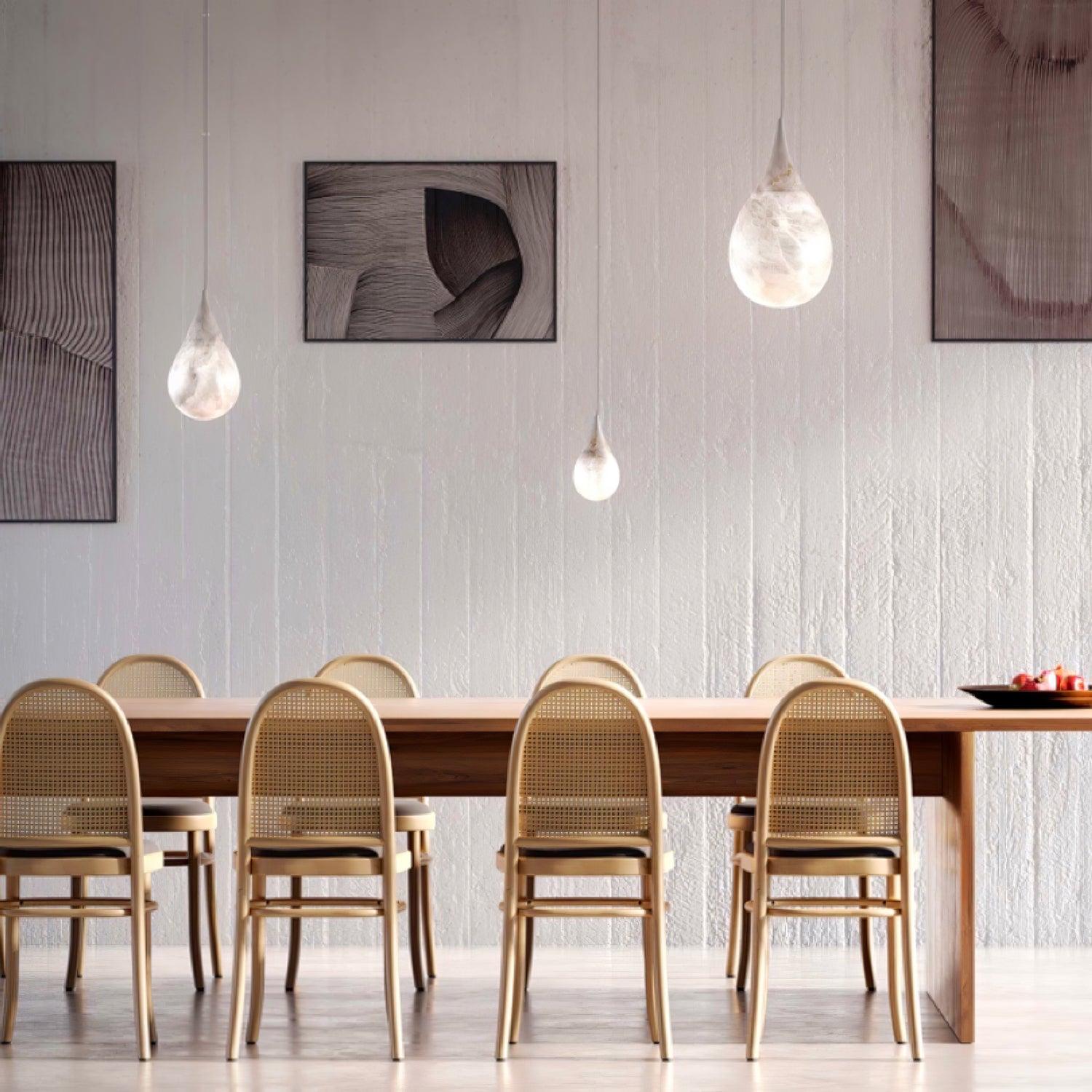 Marble droplet lights above a dining table