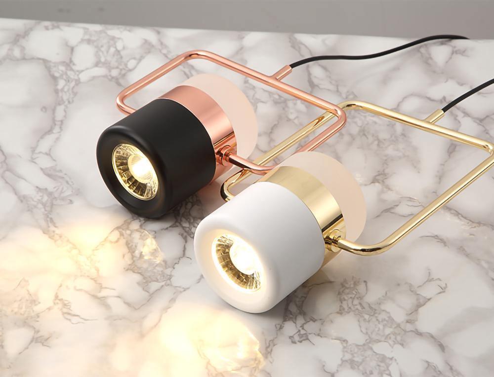 Geometric LED pendant light with adjustable cylindrical heads