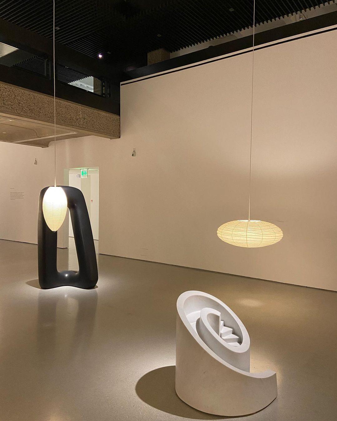 Gallery scene with a small shallow paper pendant