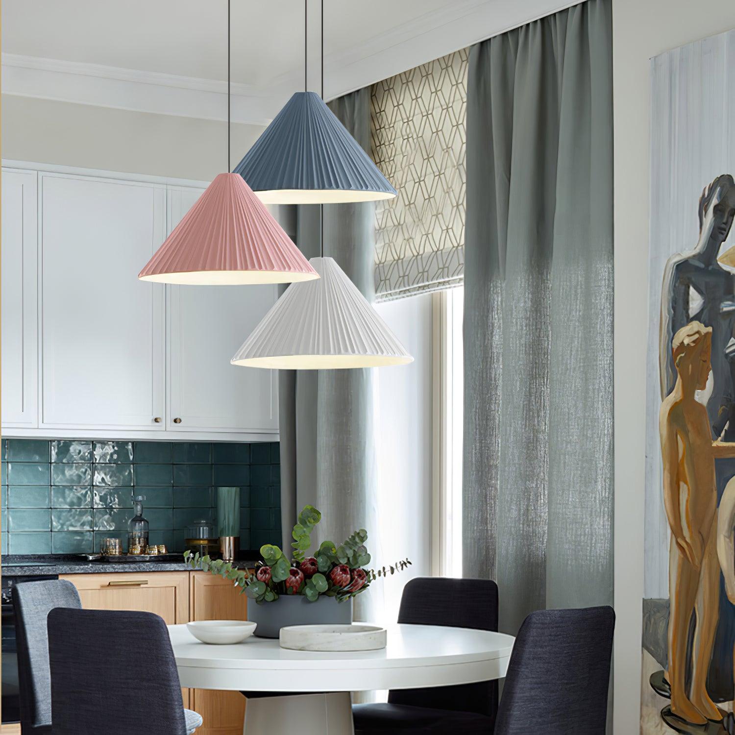 Pink Blue and White pendants in a dining area