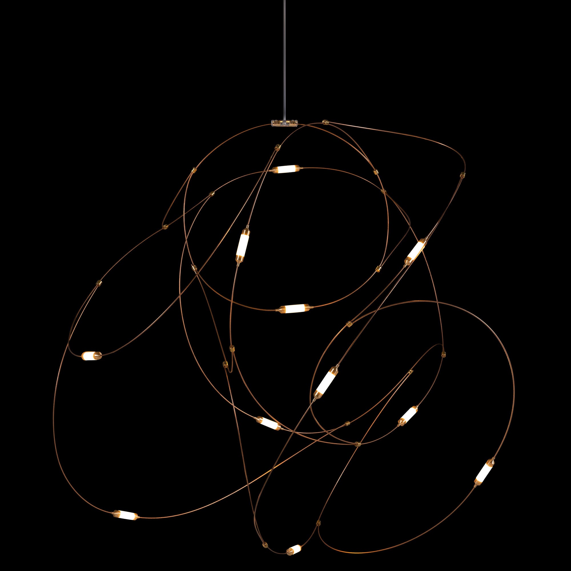 Compact gold-tone wire-loop pendant with small glowing cylindrical diffusers on black