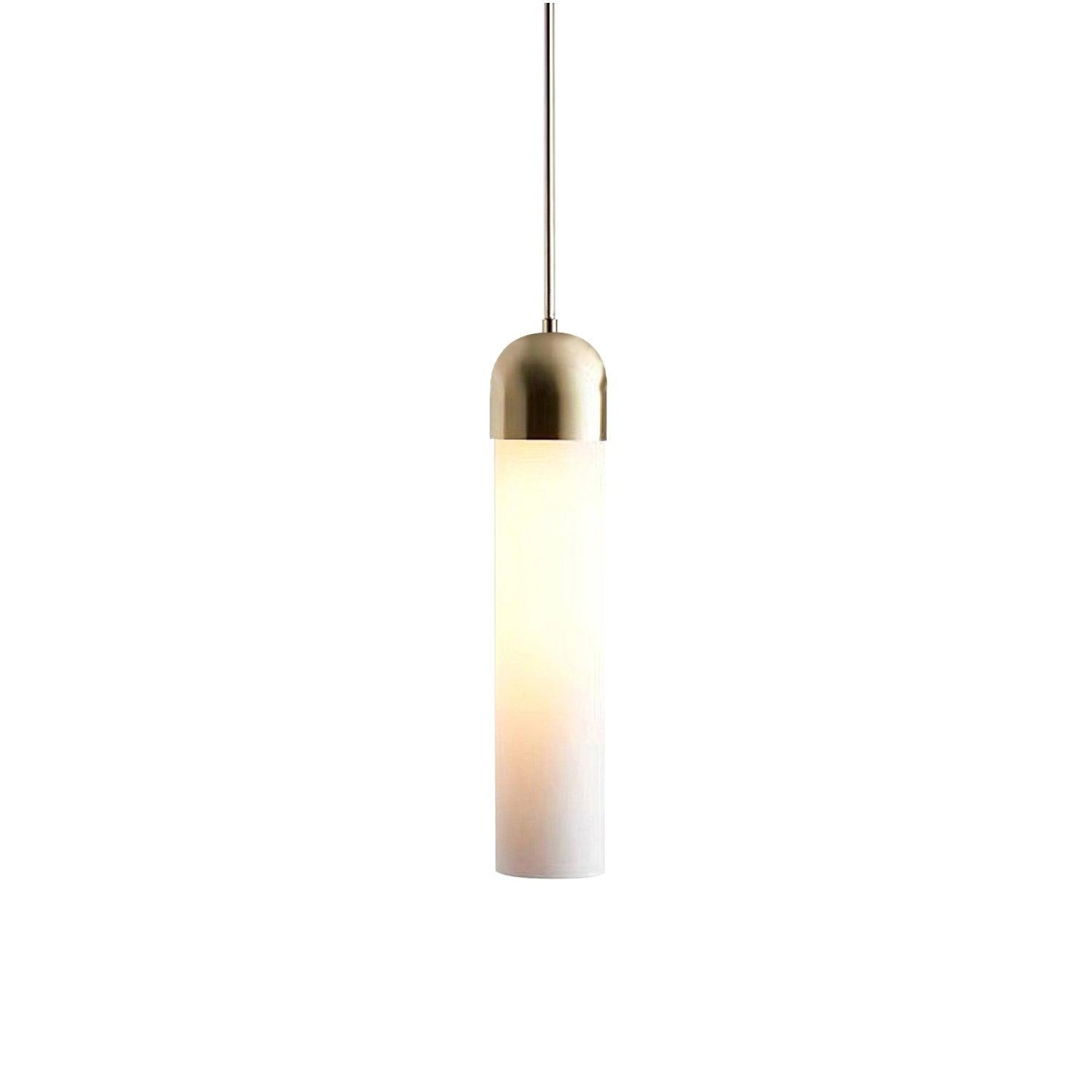 Milk white cylindrical pendant glowing below a rounded gold-tone cap on white