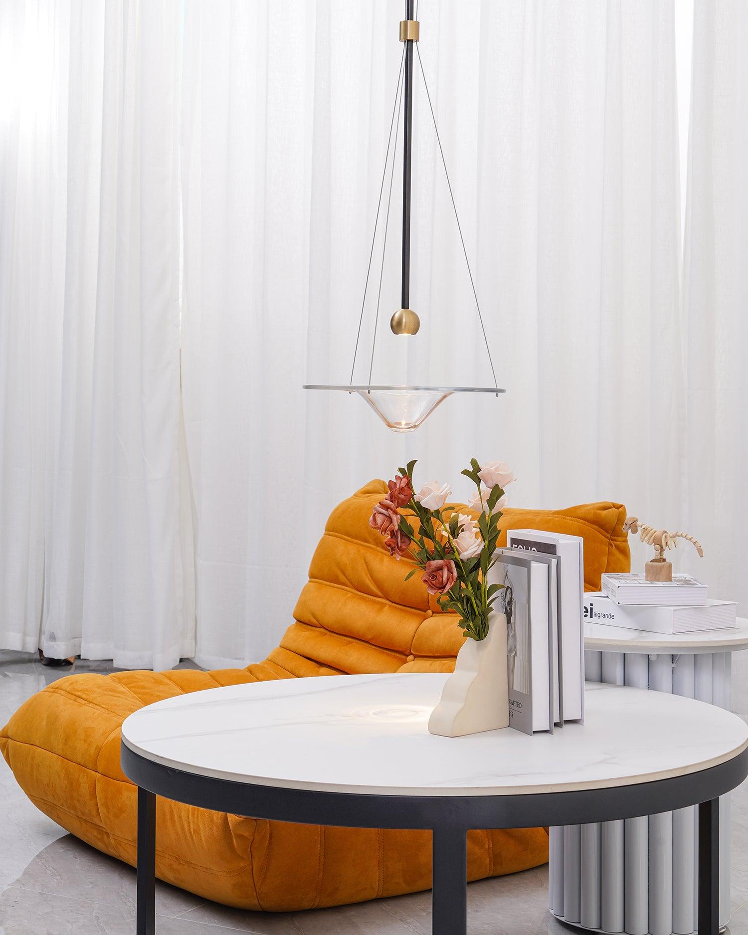 Glass pendant in a bright seating corner