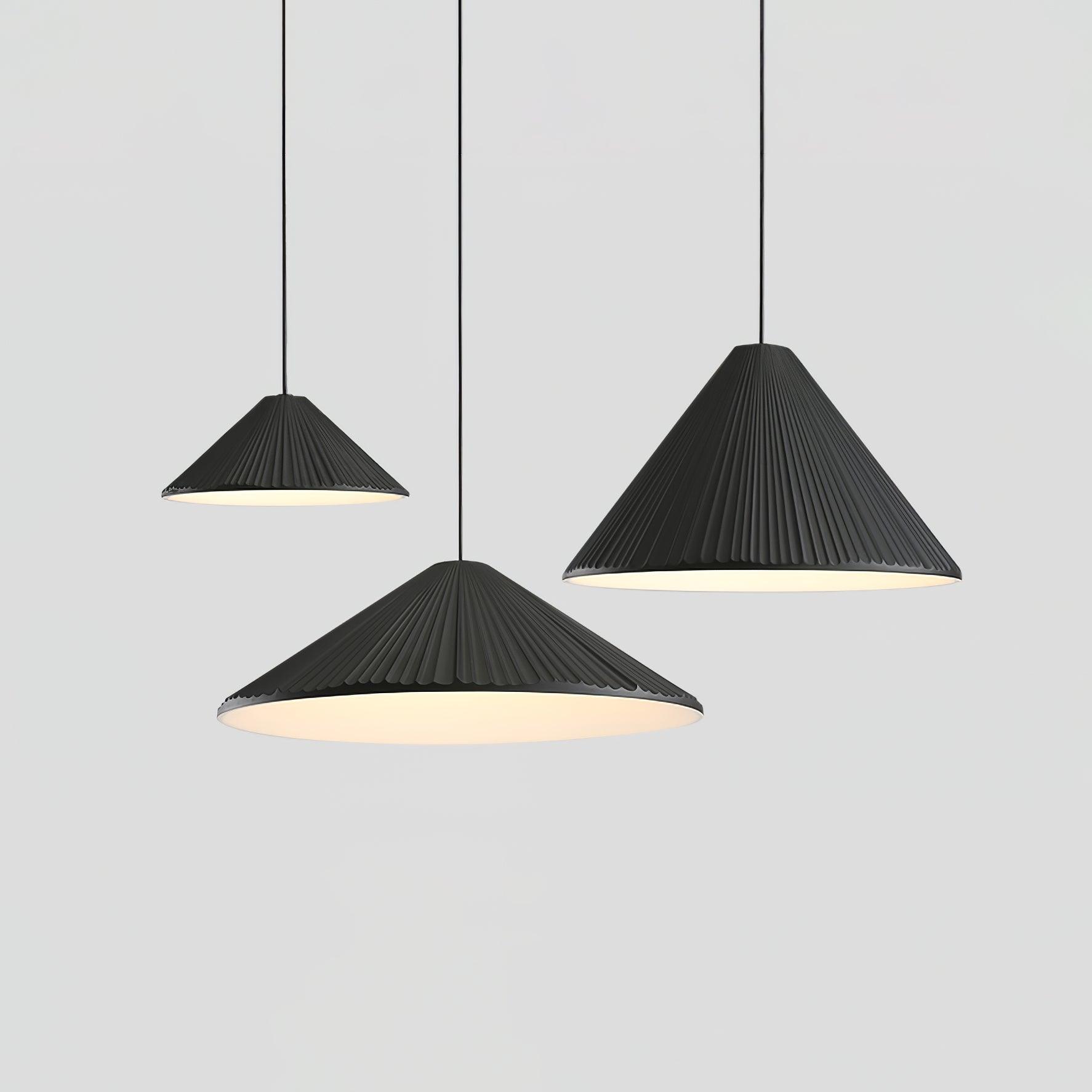 Three Black pleated shades in different proportions