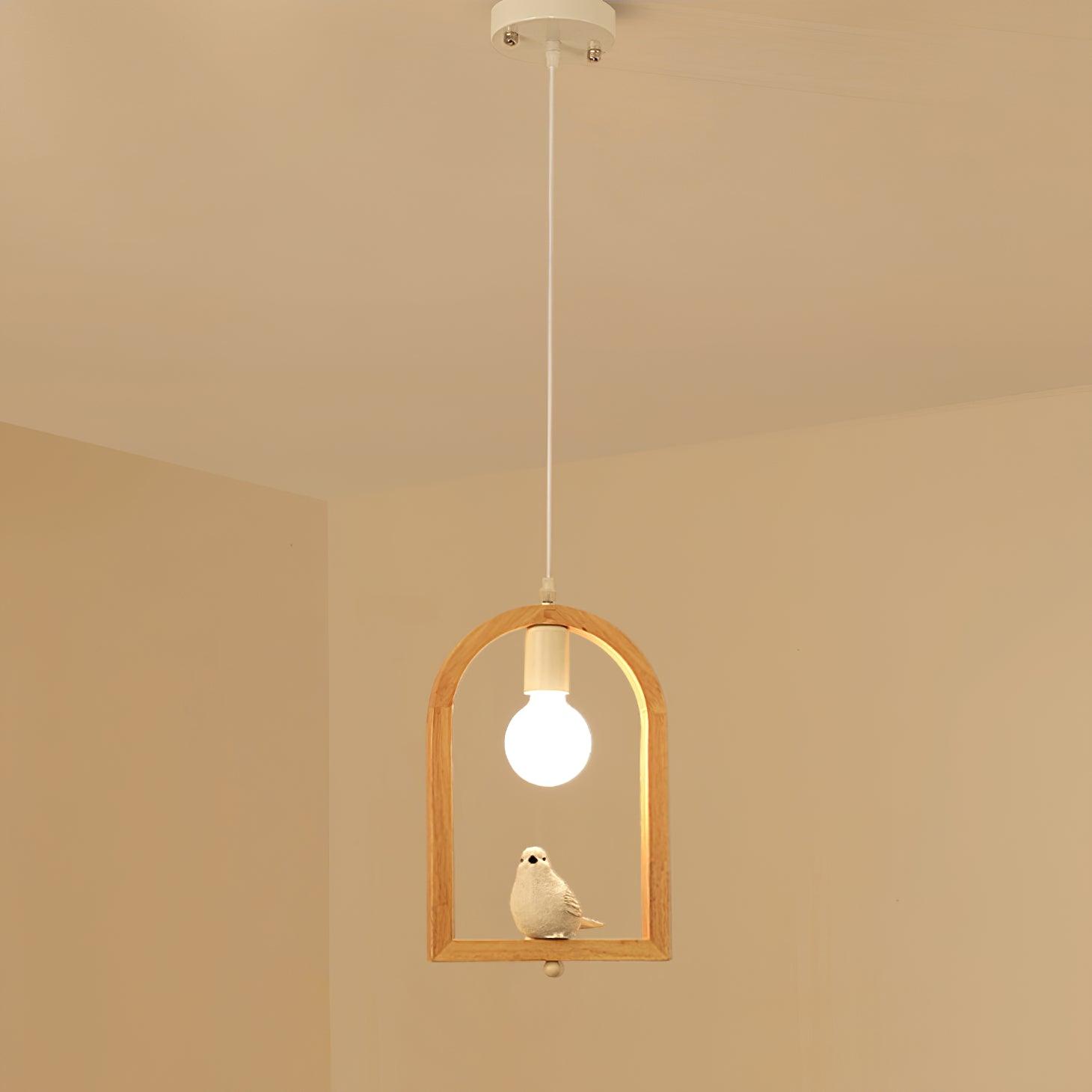 Model A wooden arch pendant with a white bird, exposed bulb and ceiling canopy