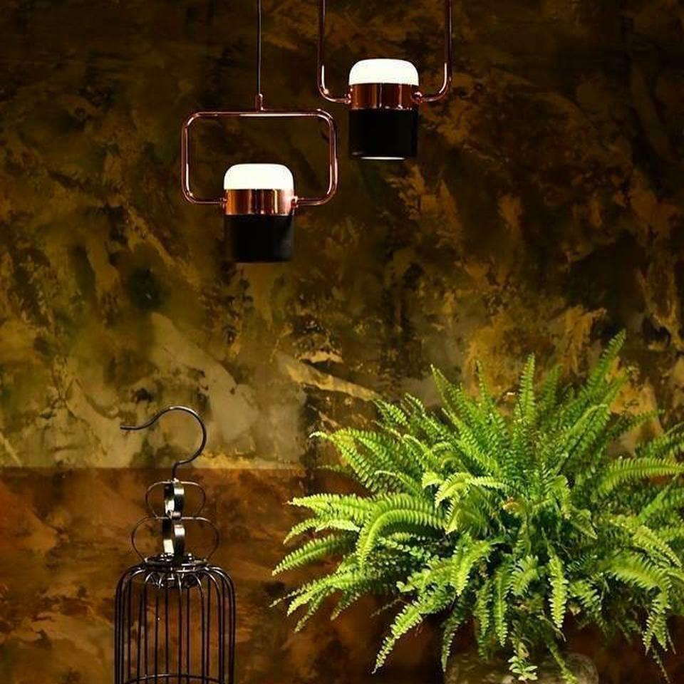 Adjustable LED pendant light with an open geometric frame