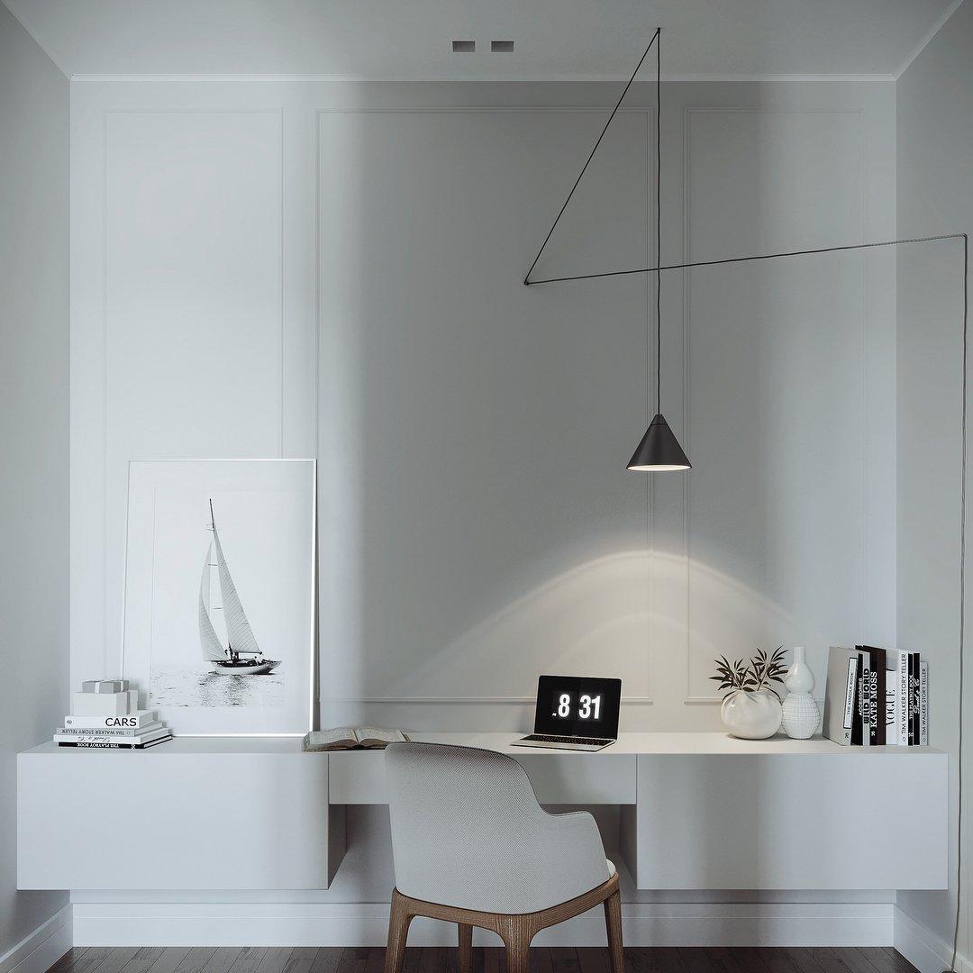 Black conical pendant and angular cable route above a white desk with laptop, books and a sailboat print