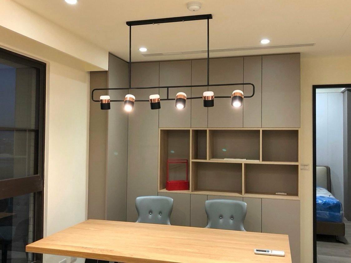 Geometric LED pendant light with adjustable cylindrical heads