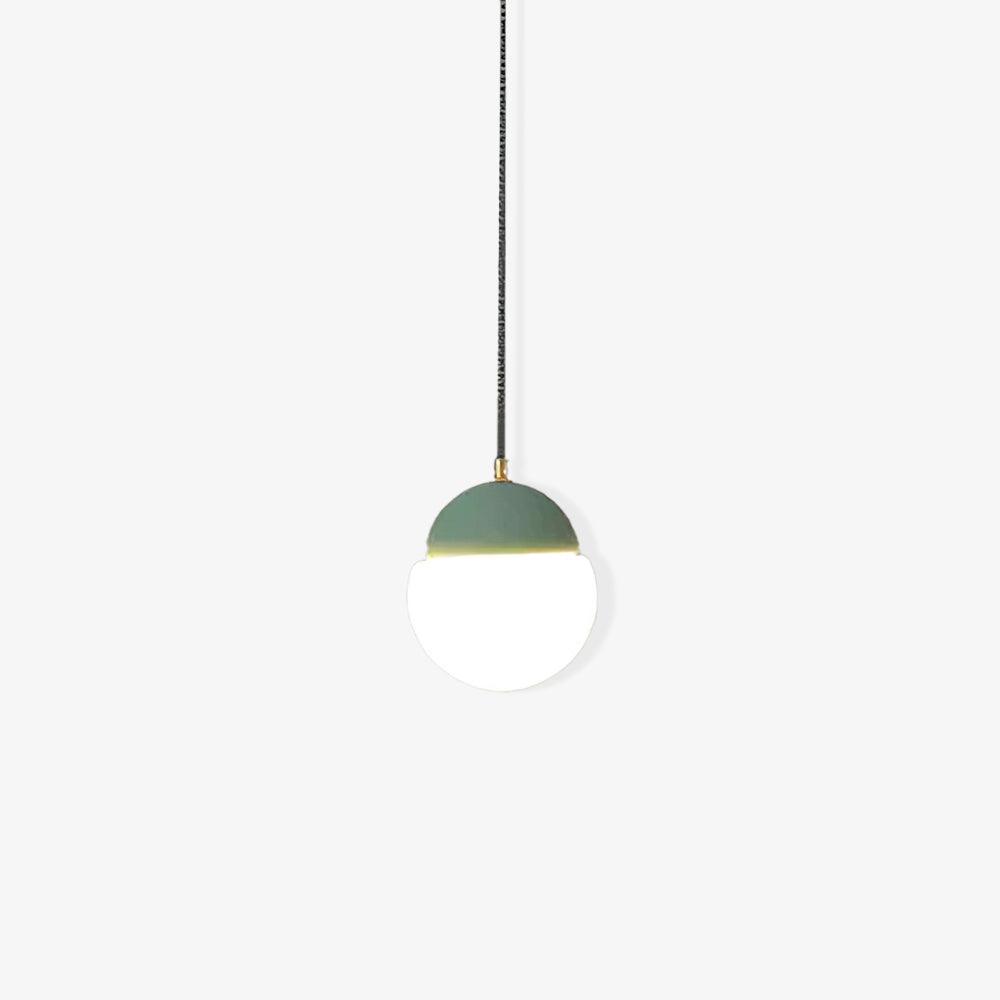 Green-capped pendant isolated on a pale background