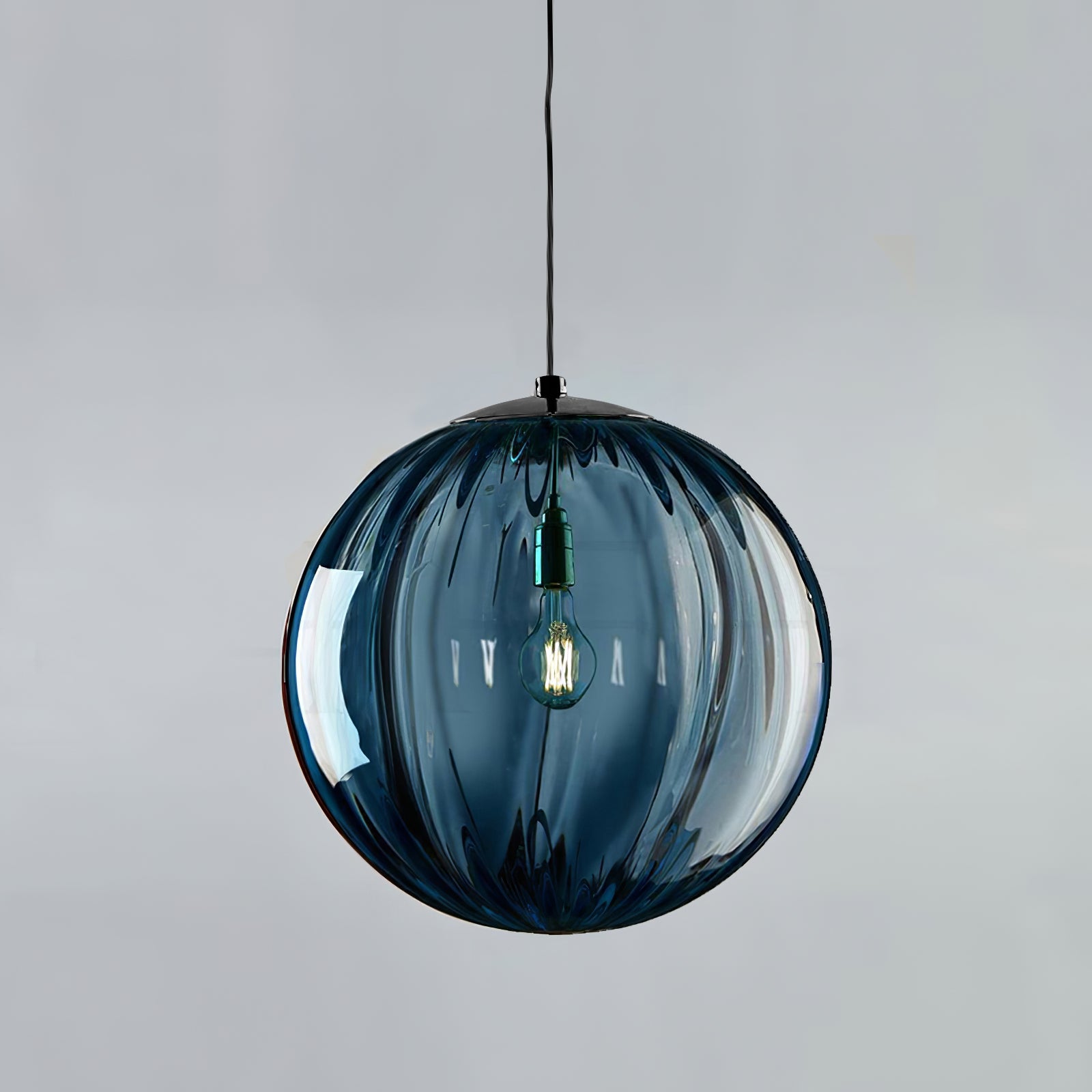 Paola pendant light with a coloured glass globe and small metal cap