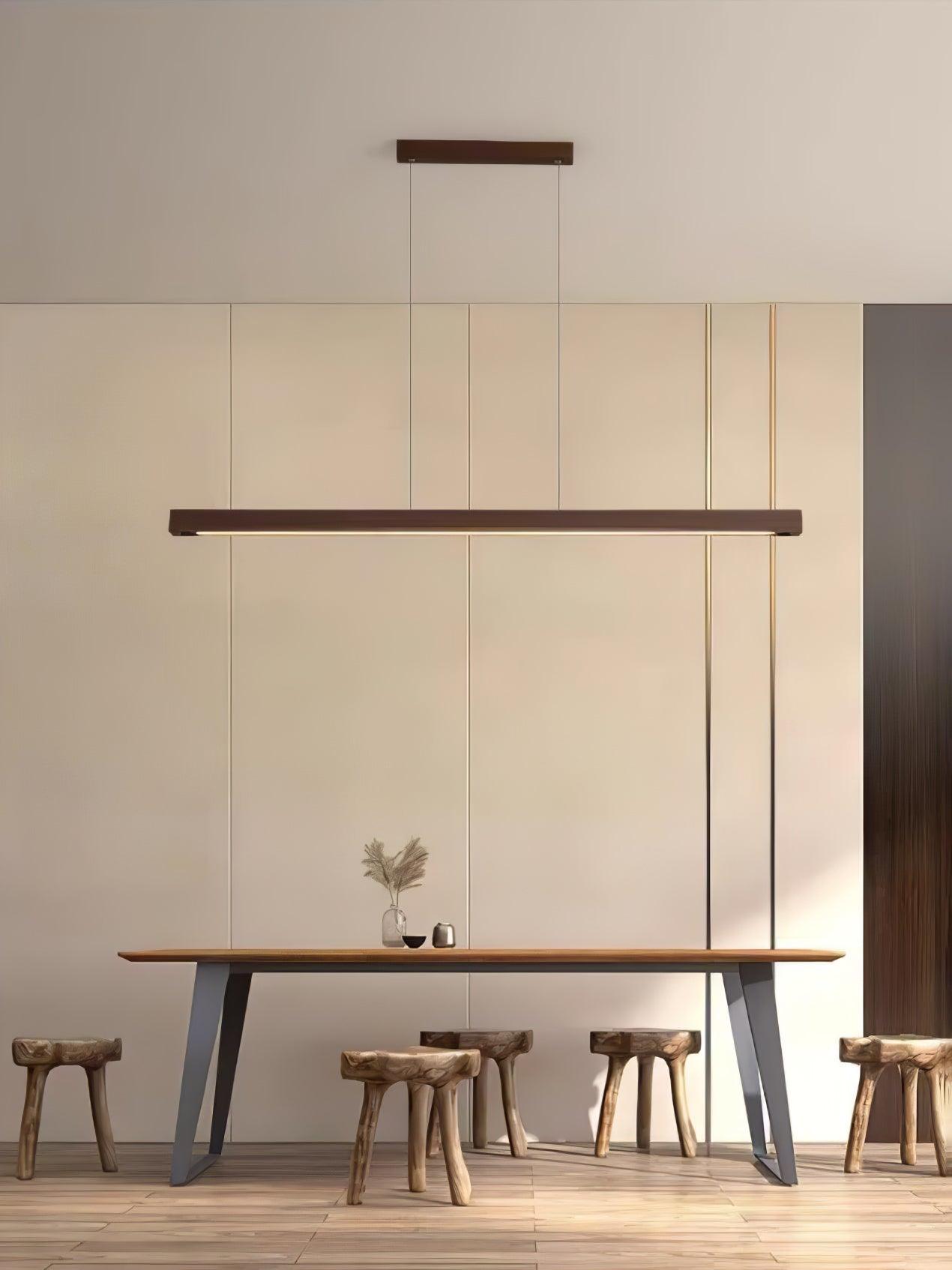 Walnut-colour pendant and canopy above a dining table