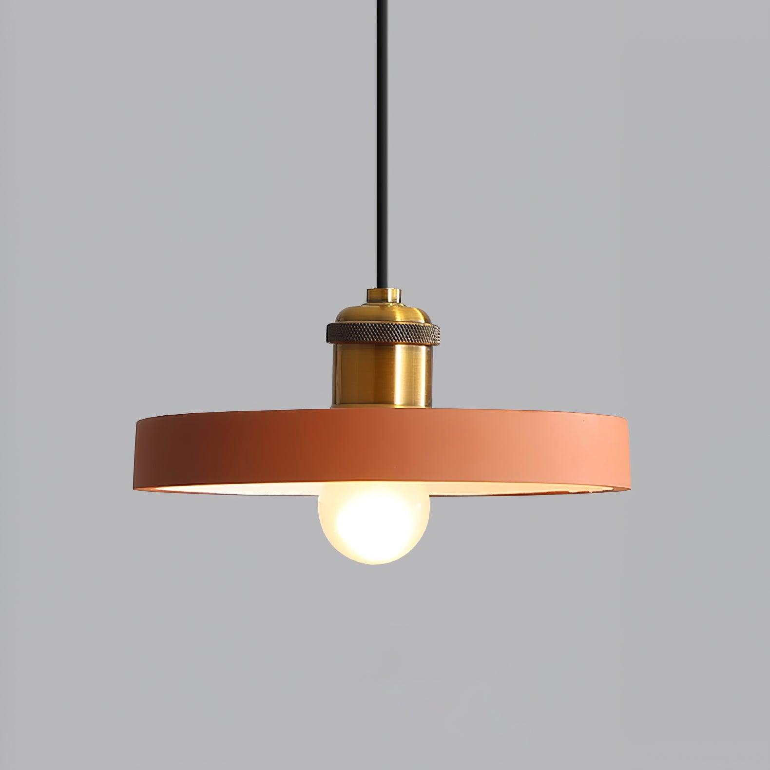 Orange disc and exposed bulb close-up