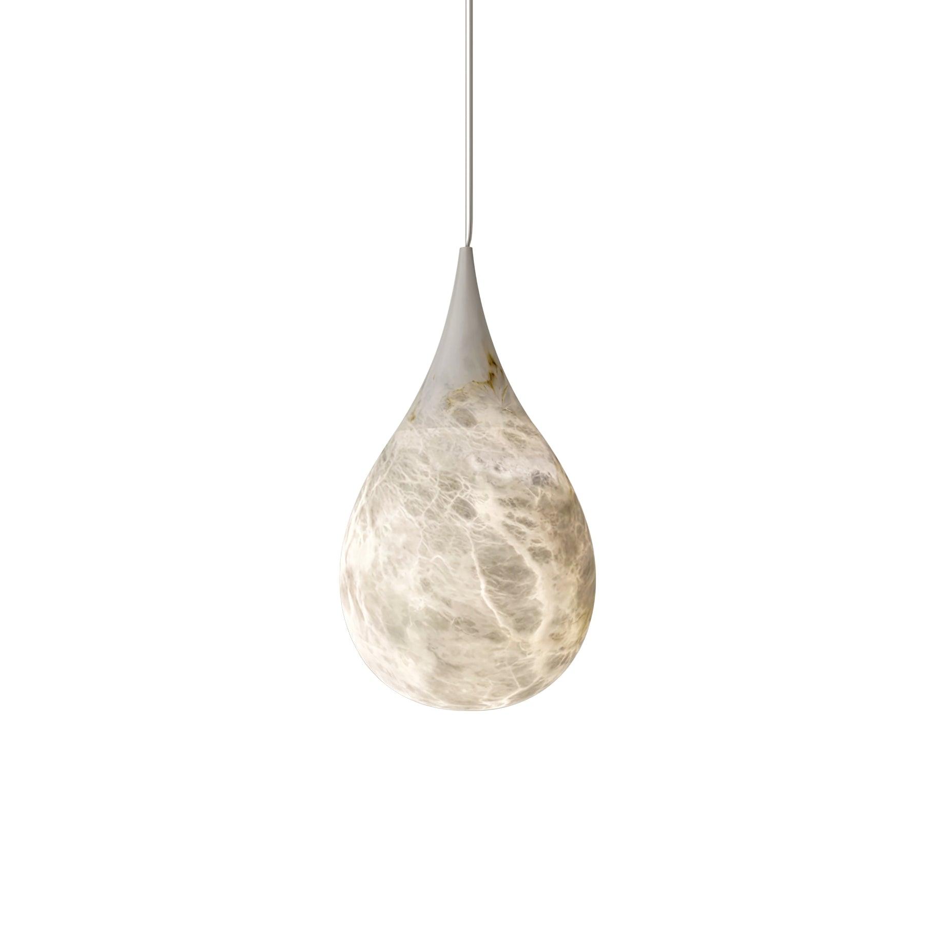 White marble teardrop on a pale background