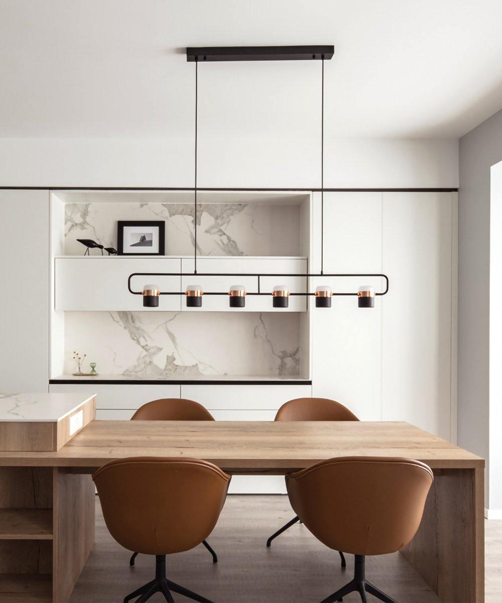 Geometric LED pendant light with adjustable cylindrical heads