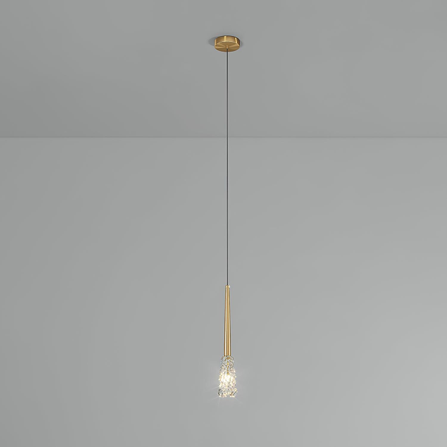 Single Gold Mozzi pendant on a pale background