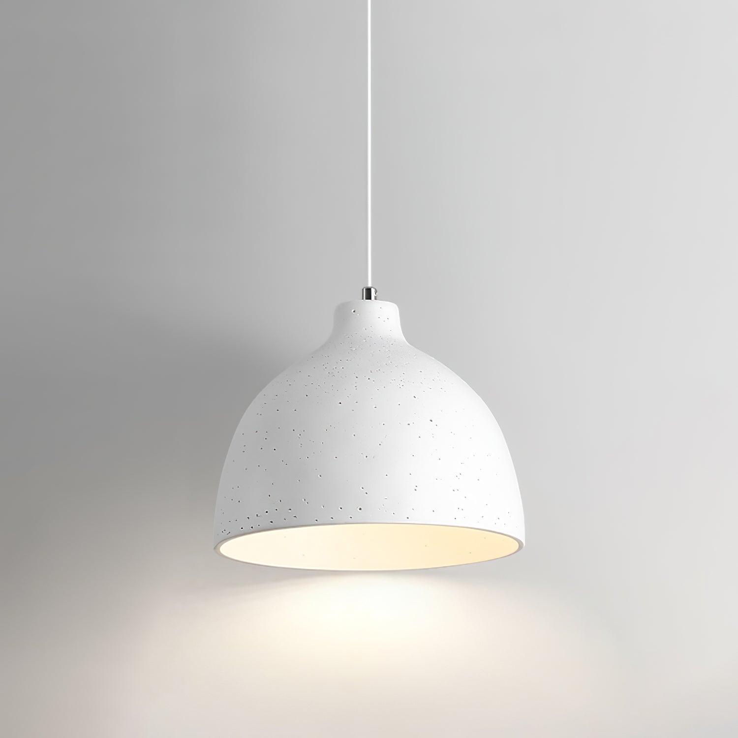 White speckled pendant casting light downward