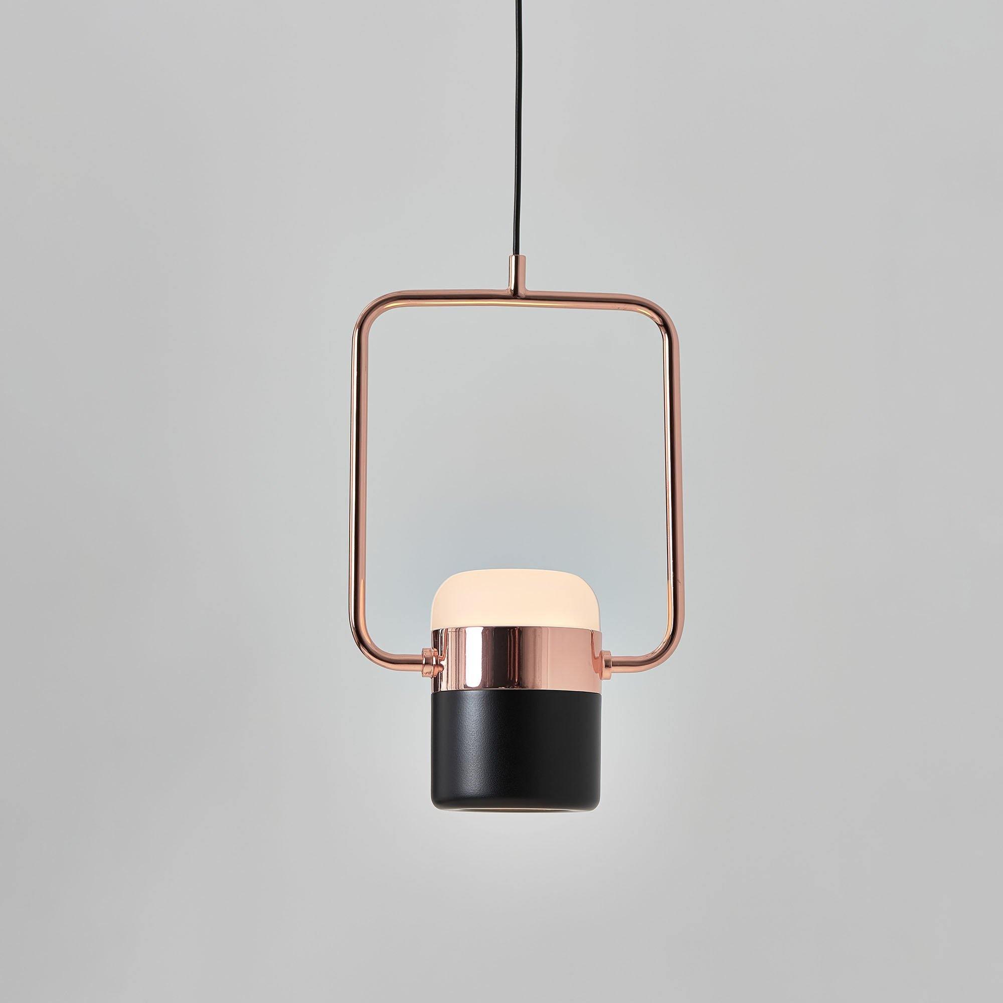 Geometric LED pendant light with adjustable cylindrical heads