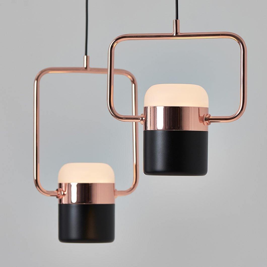 Rose-gold-tone pendant frames with black cylindrical light heads