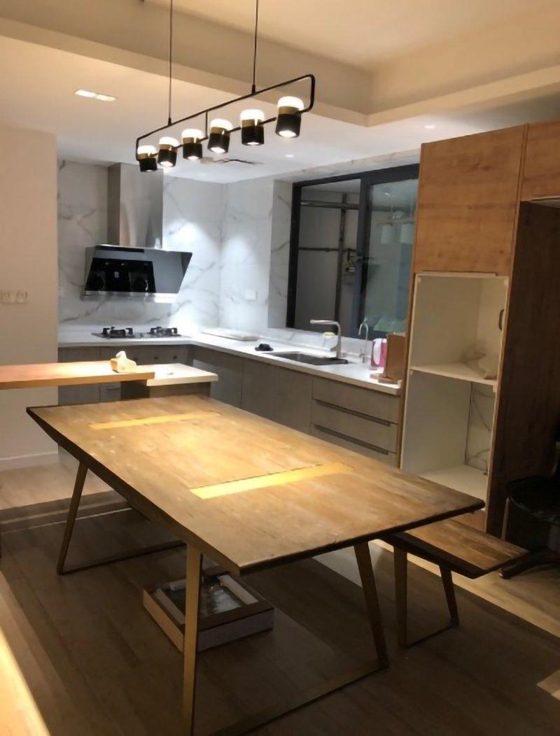 Geometric LED pendant light with adjustable cylindrical heads