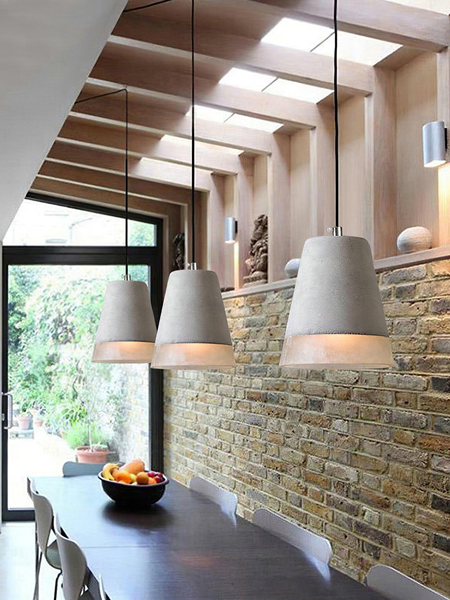 Tapered Delia pendants beneath a skylight
