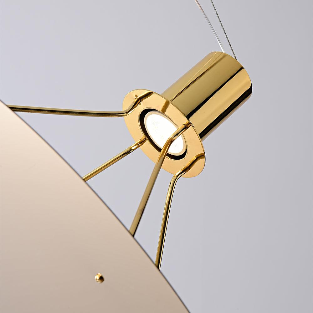 Gold cylindrical head and triangular support close-up