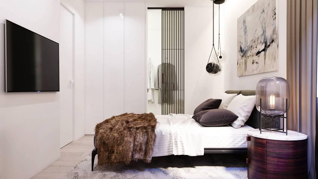 Small glass pendant near a bedroom wall