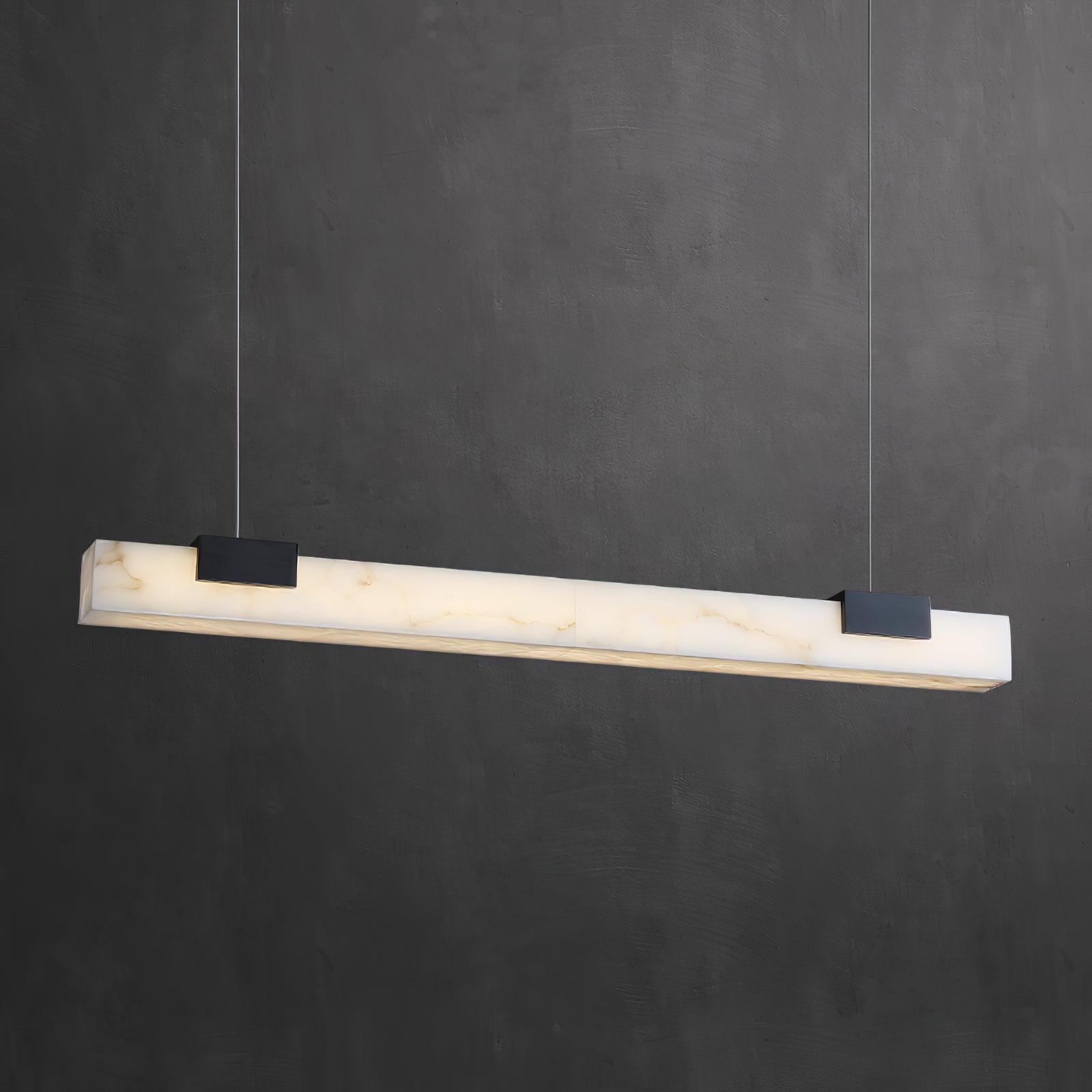 Angled white veined pendant bar with black supports against a dark textured wall