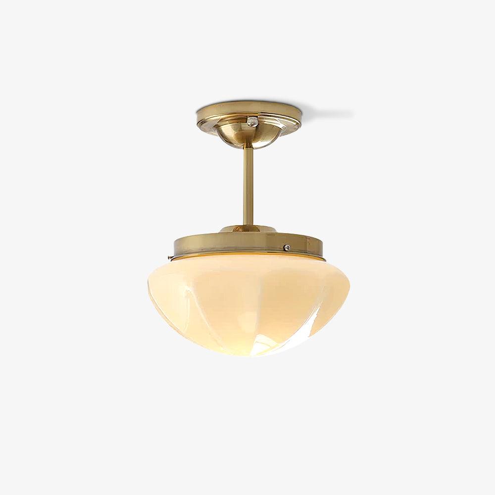 Illuminated Gold Marta light on a longer stem