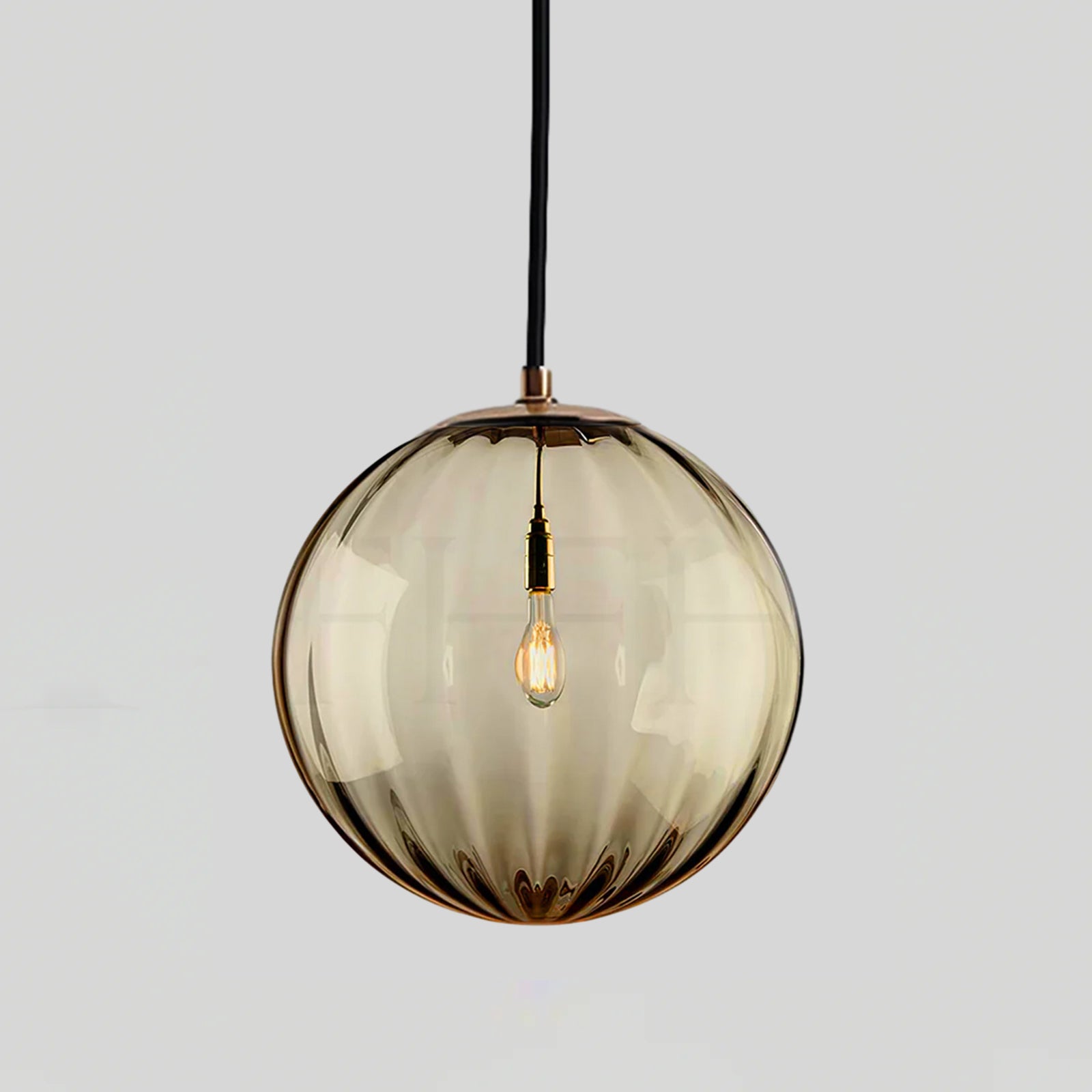 Paola pendant light with a coloured glass globe and small metal cap